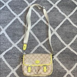 All weather Coach Signature purse